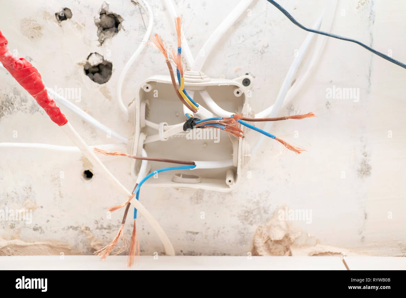 electric transfer case with bare copper wires during construction Stock
