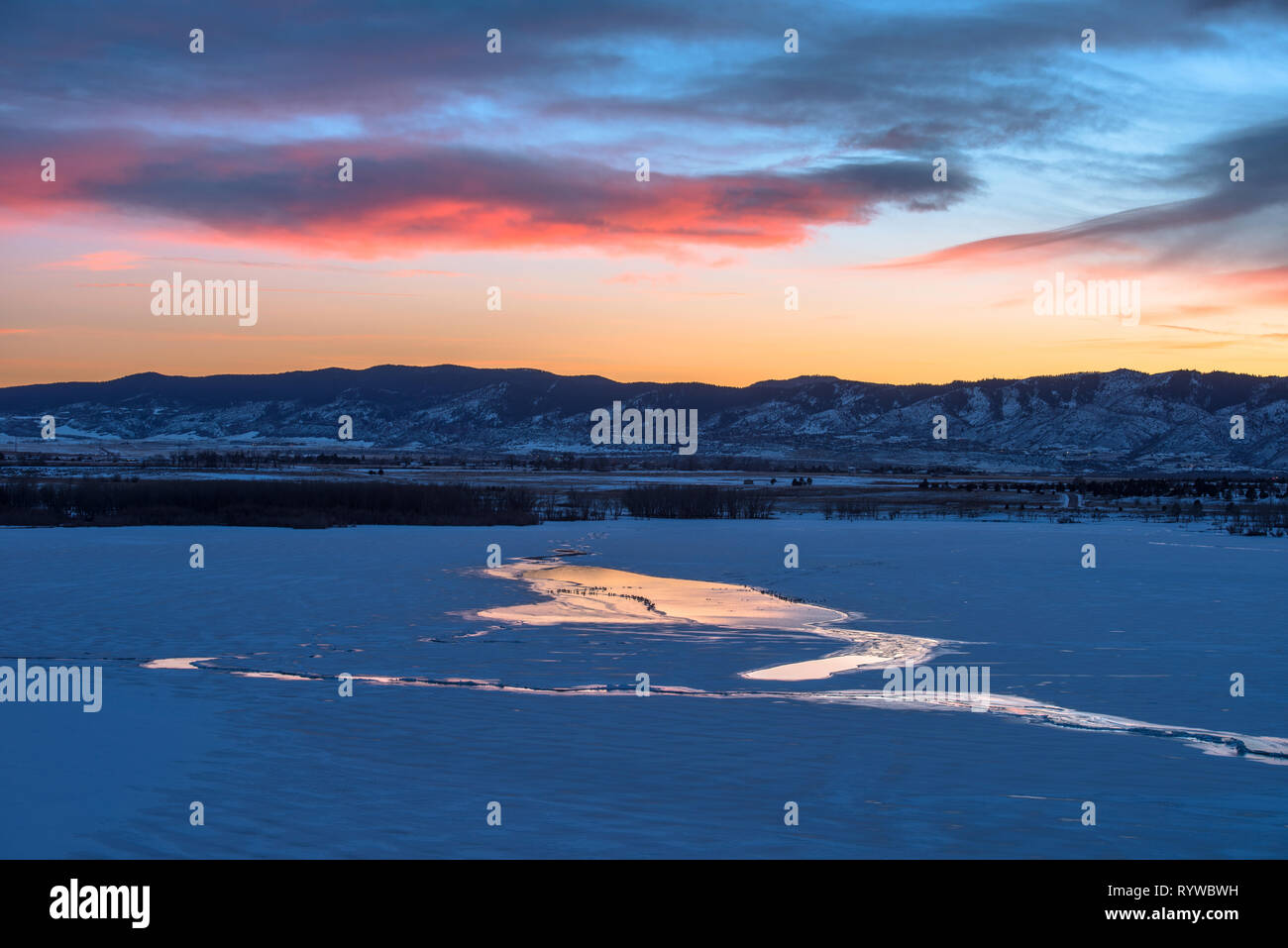 Sunset Frozen Lake Sunset view of a frozen mountain lake. Chatfield
