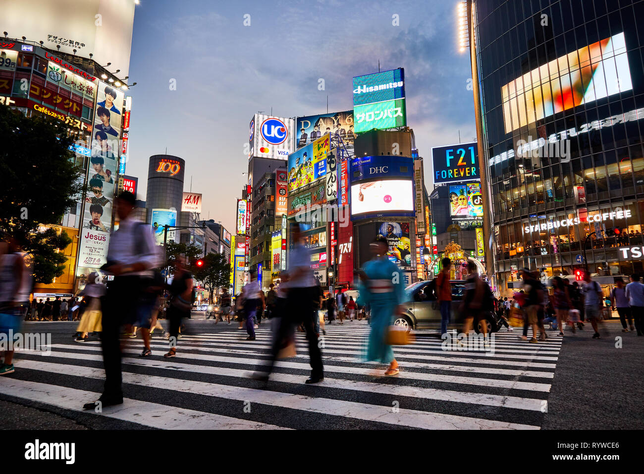 Pictured is Shibuya Crossing Tokyo at night, Japan. Stock Photo