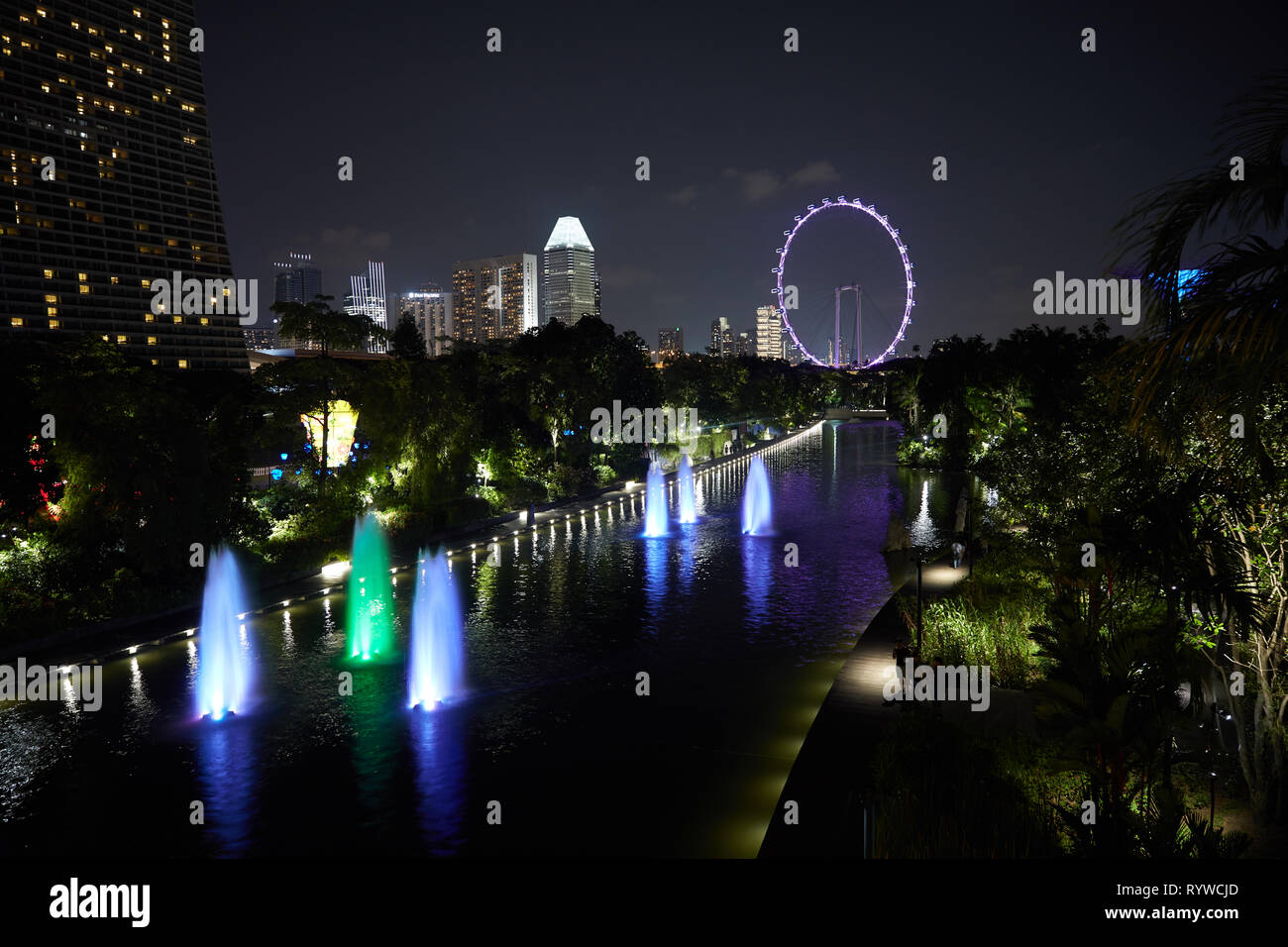Pictured is the Singapore Flyer a giant Ferris wheel in Singapore. Stock Photo