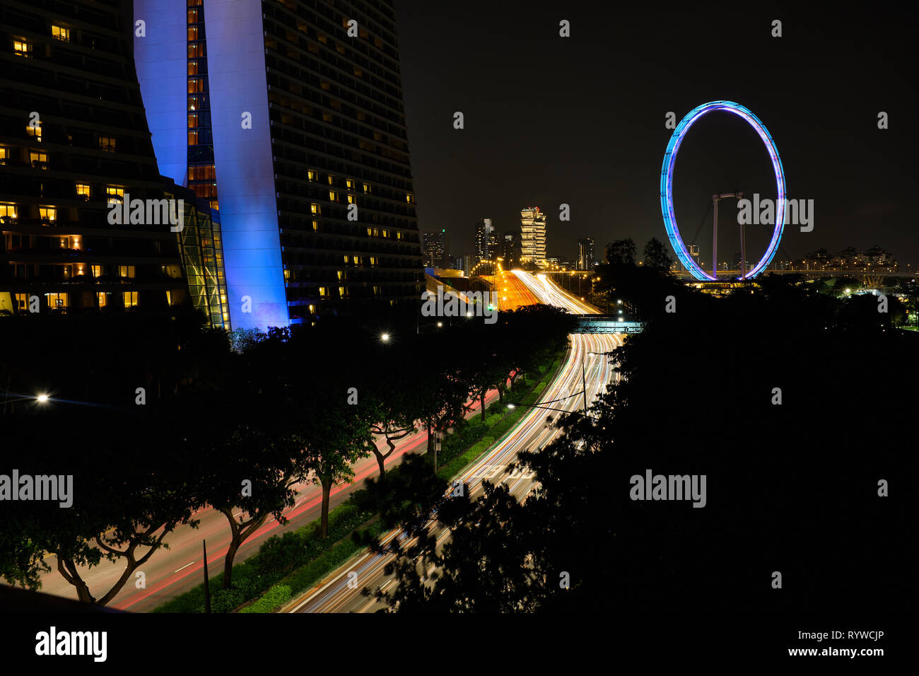 Pictured is the Singapore Flyer a giant Ferris wheel in Singapore. Stock Photo