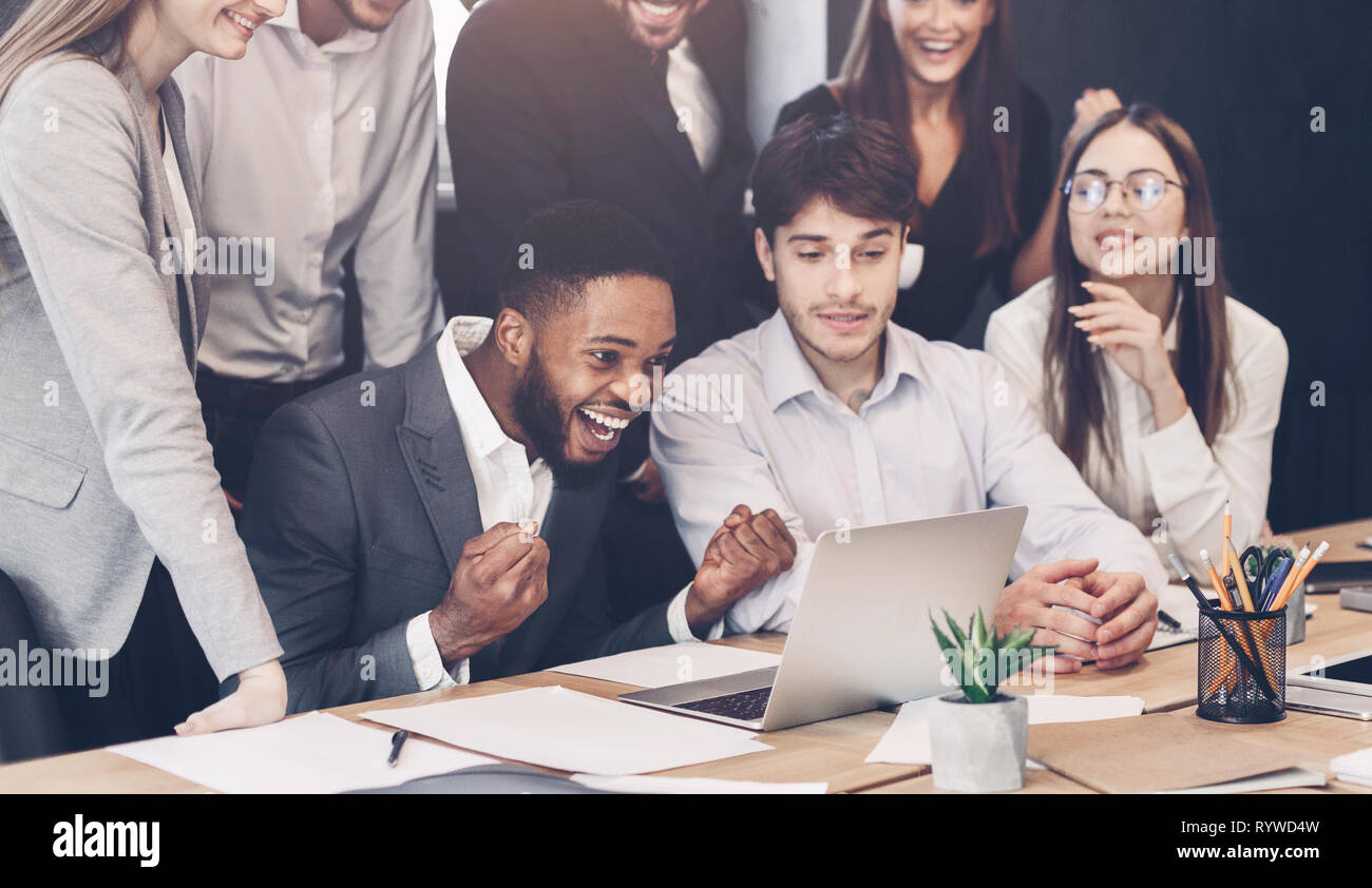 Group diverse coworkers celebrating hi-res stock photography and images ...