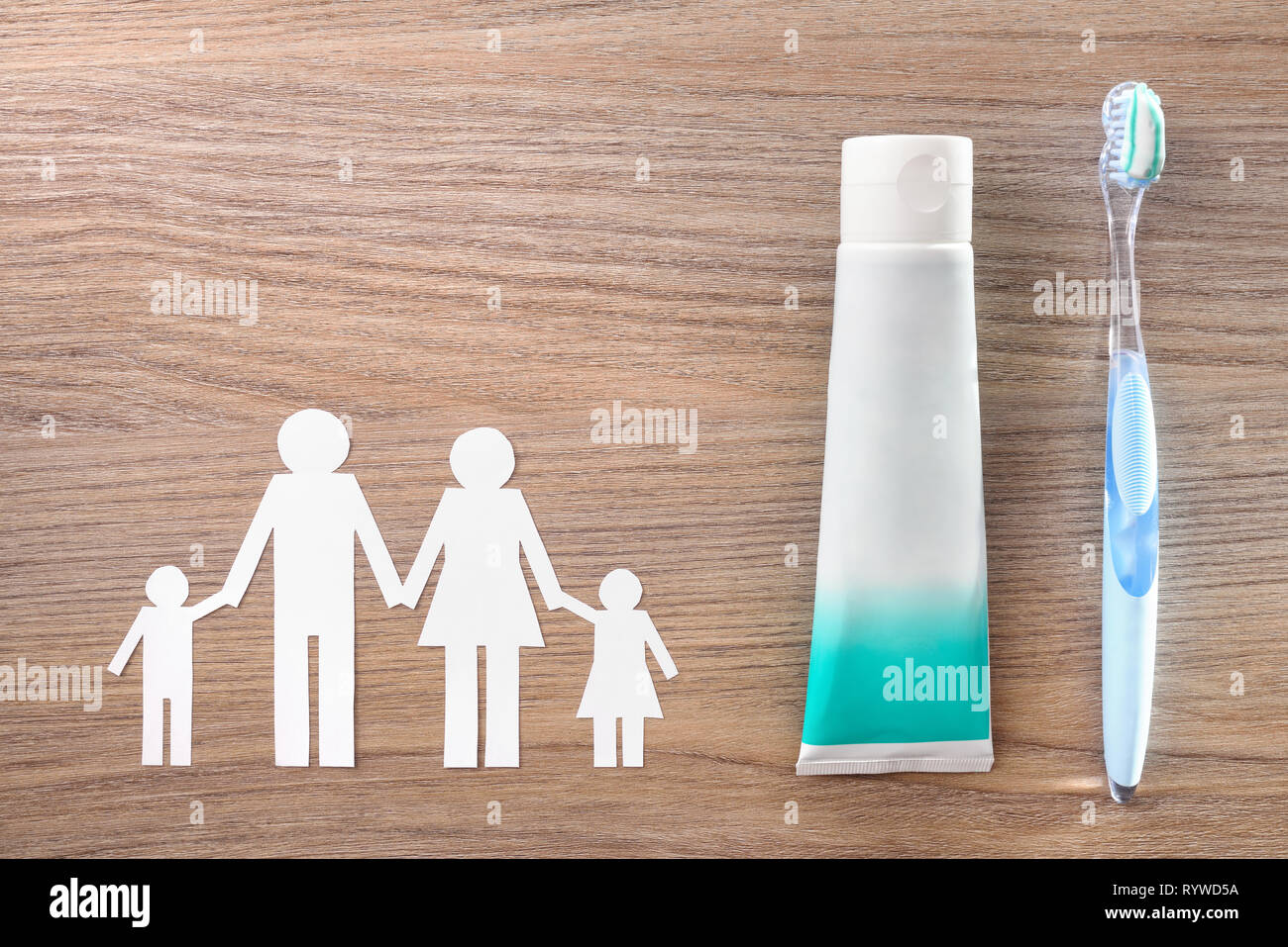 Concept of teeth cleaning at home of the whole family with glass jar