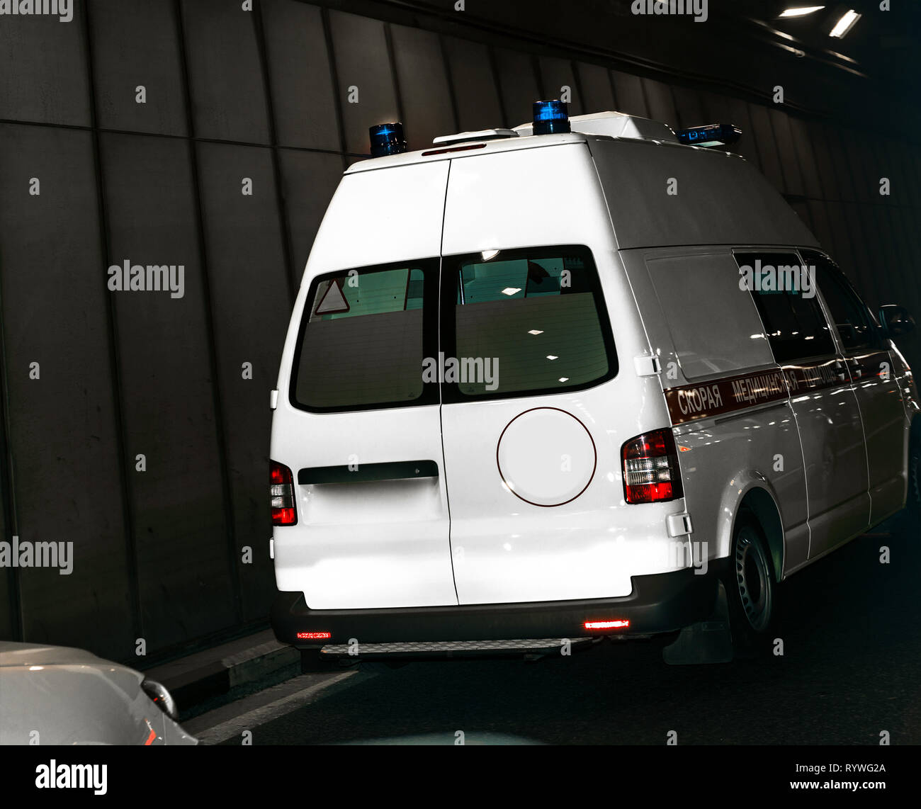 ambulance van drives in tunnel Stock Photo