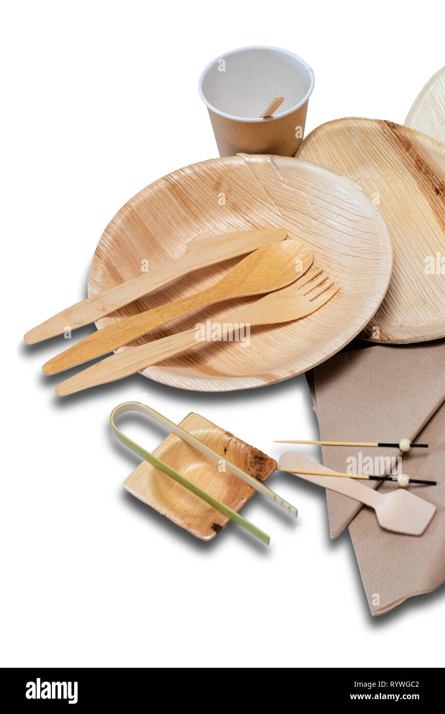 Bamboo disposable tableware and plates and cutlery for picnic on the white background Stock