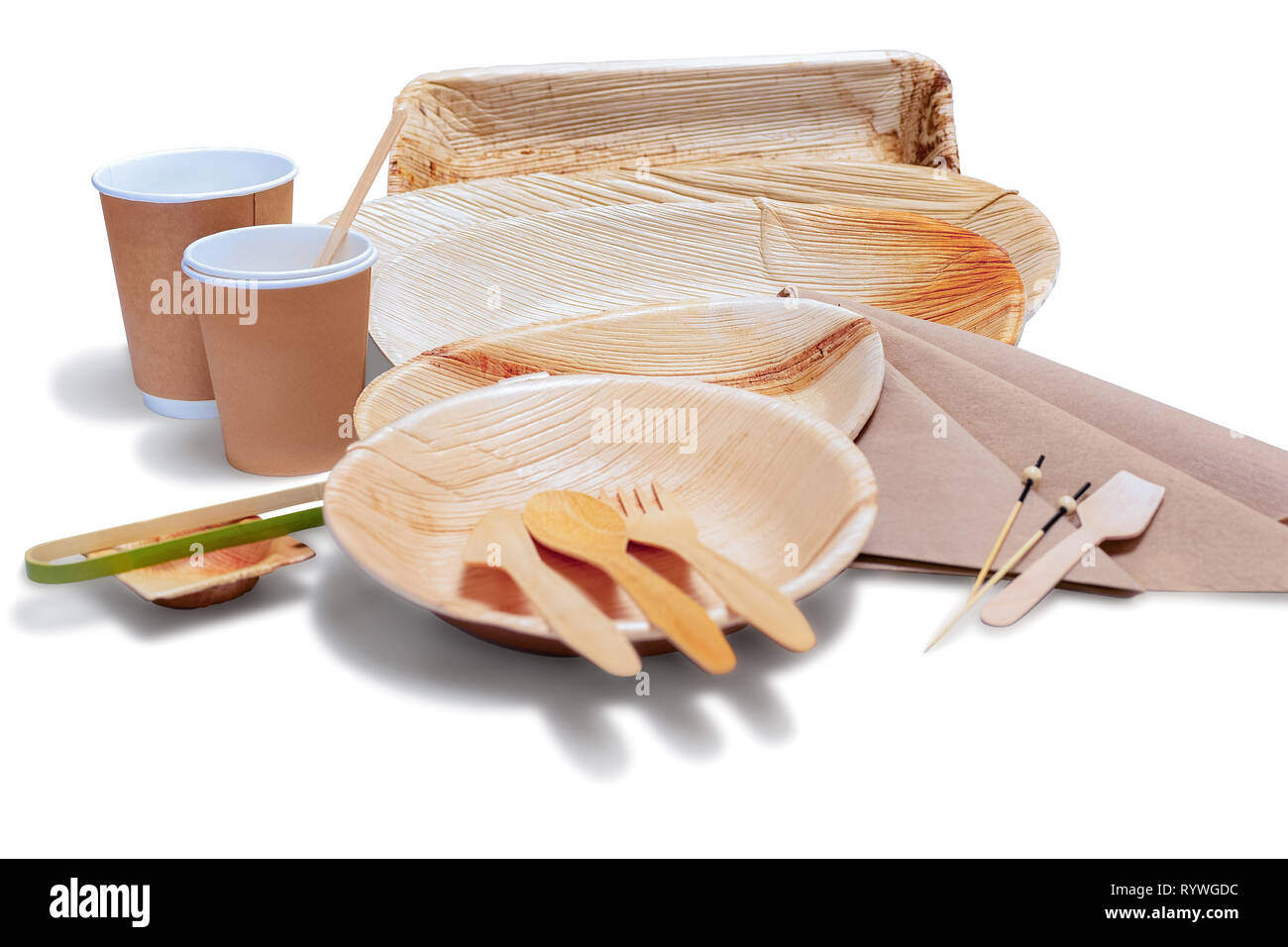 Wooden bamboo disposable tableware with plates and cutlery for picnic on the white background