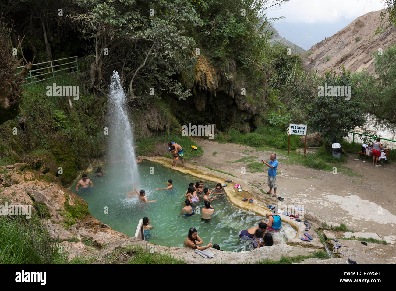 Churin, Lima. February 12, 2019 - Unknown people enjoying a day of relaxation in the natural hot spring pool of Churin, Lima Stock Photo