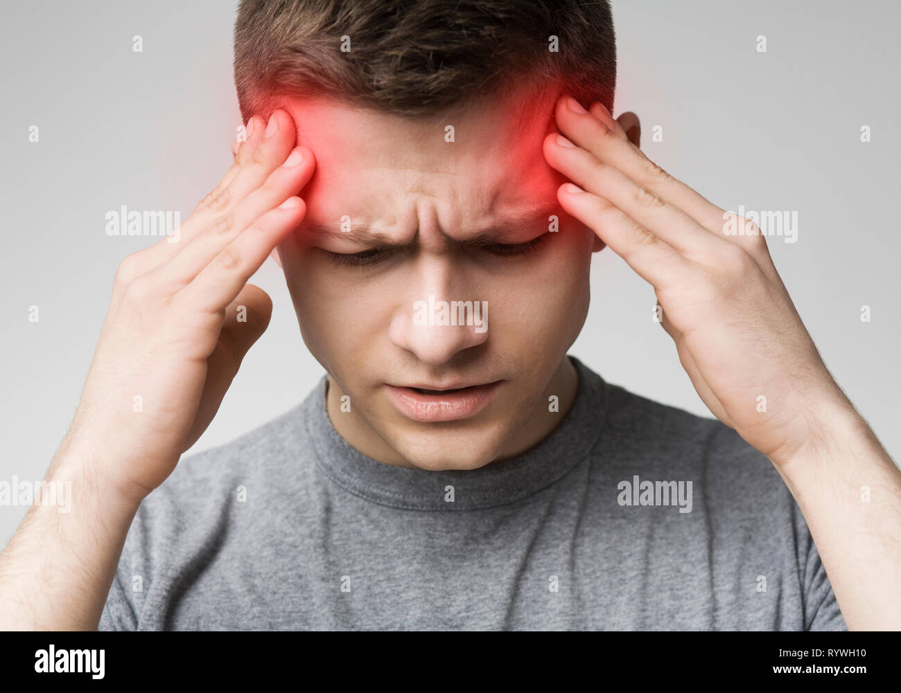 Man Suffering From Headache Touching His Temples Stock Photo Alamy