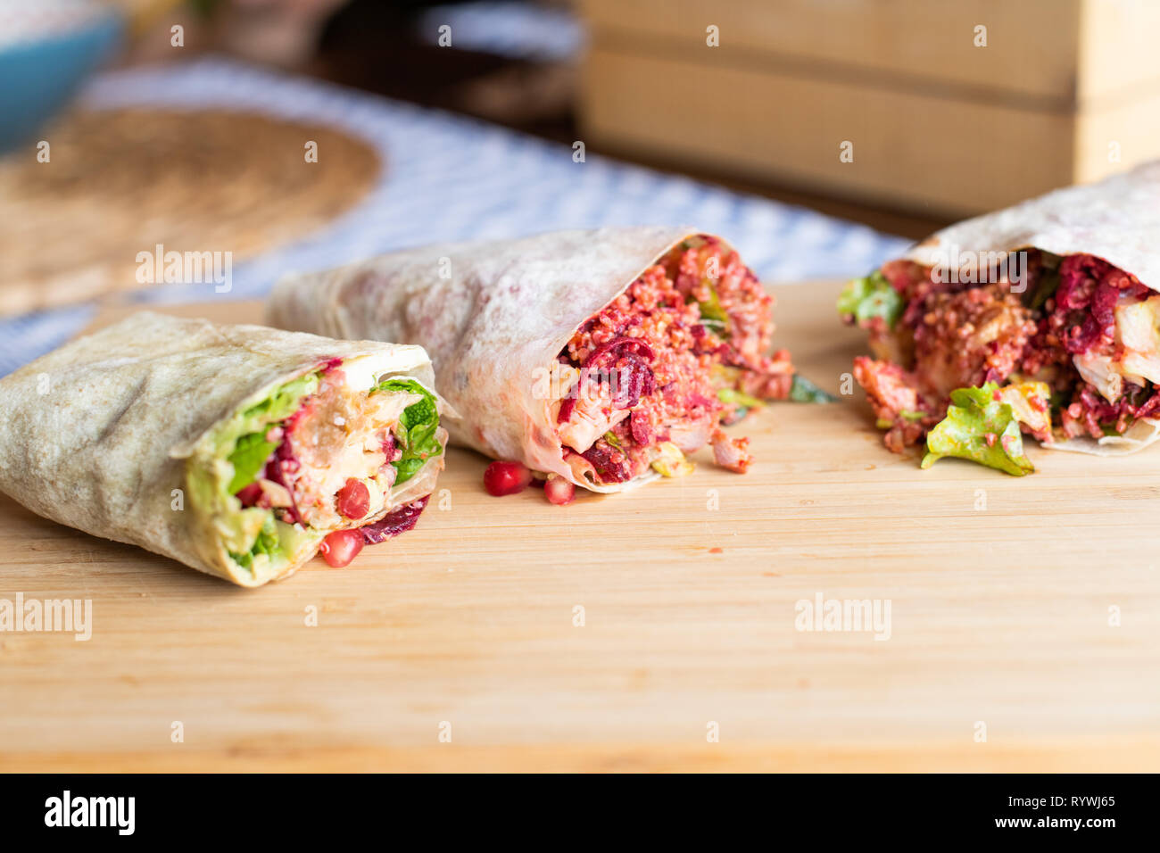 Organic Healthy Wraps with salad, quinoa, grilled chicken, red ...