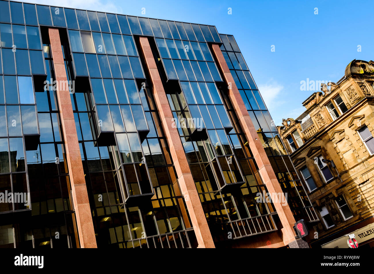 A modern glass fronted office building in West Nile Street, Glasgow, Scotland Stock Photo