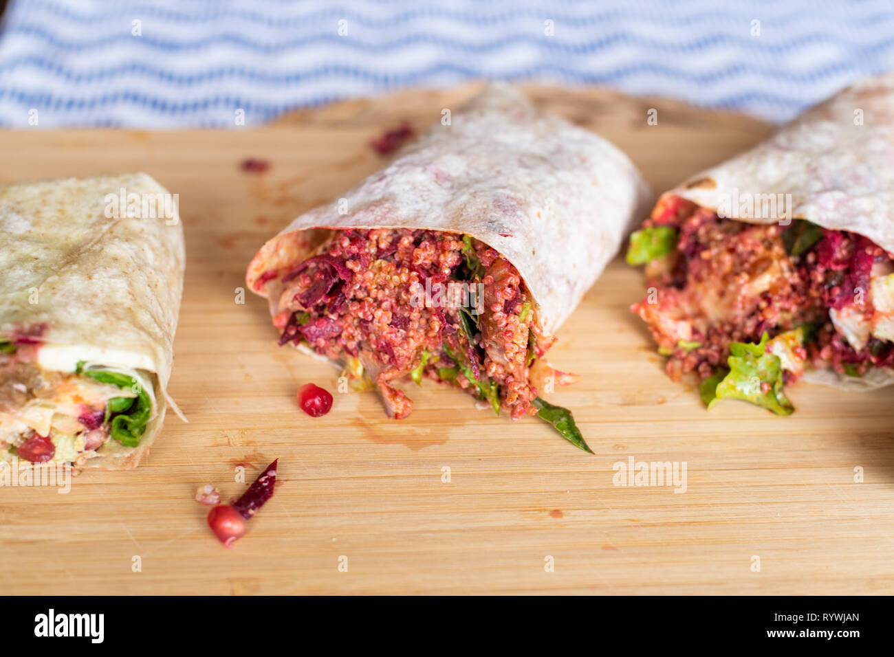 Organic Healthy Wraps with salad, quinoa, grilled chicken, red ...