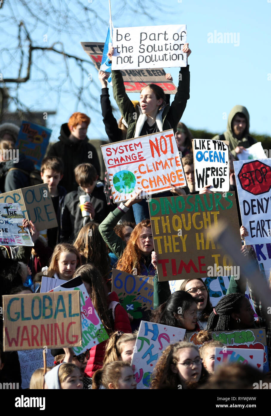 Students take part in a global school strike for climate change outside the Scottish Parliament building in Edinburgh, as protests are planned in 100 towns and cities in the UK. Stock Photo