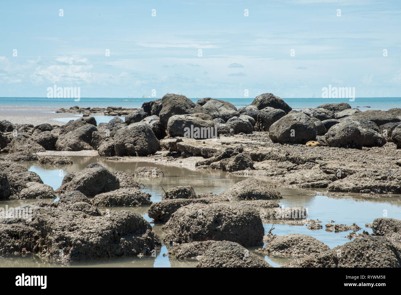 Natural rock on the Timor Sea coastline at the Casuarina Beach during ...