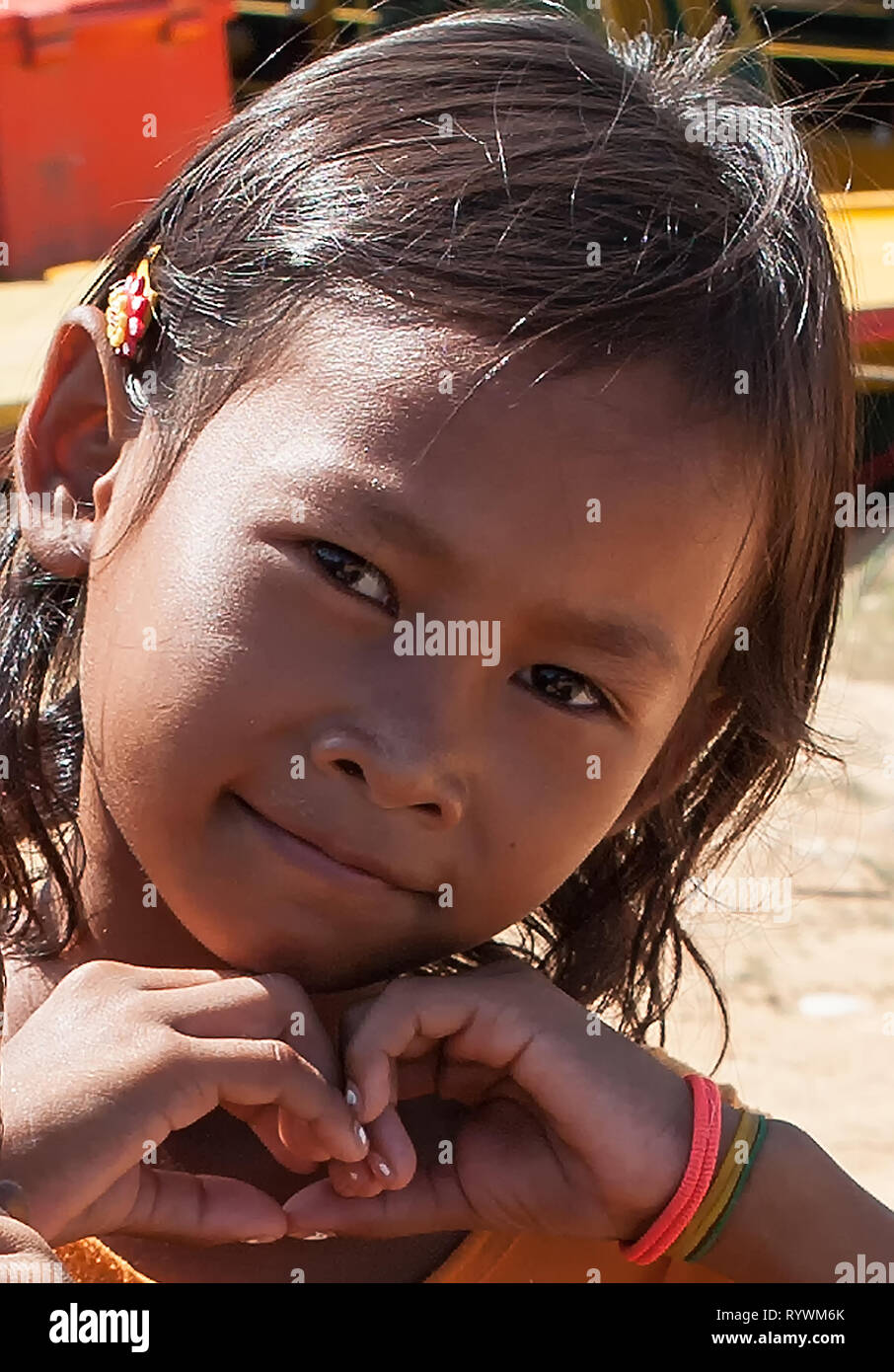 Little girl at Phumi Kouk Pouth on Tonlé Sap Lake, Siem Reap, Cambodia Stock Photo