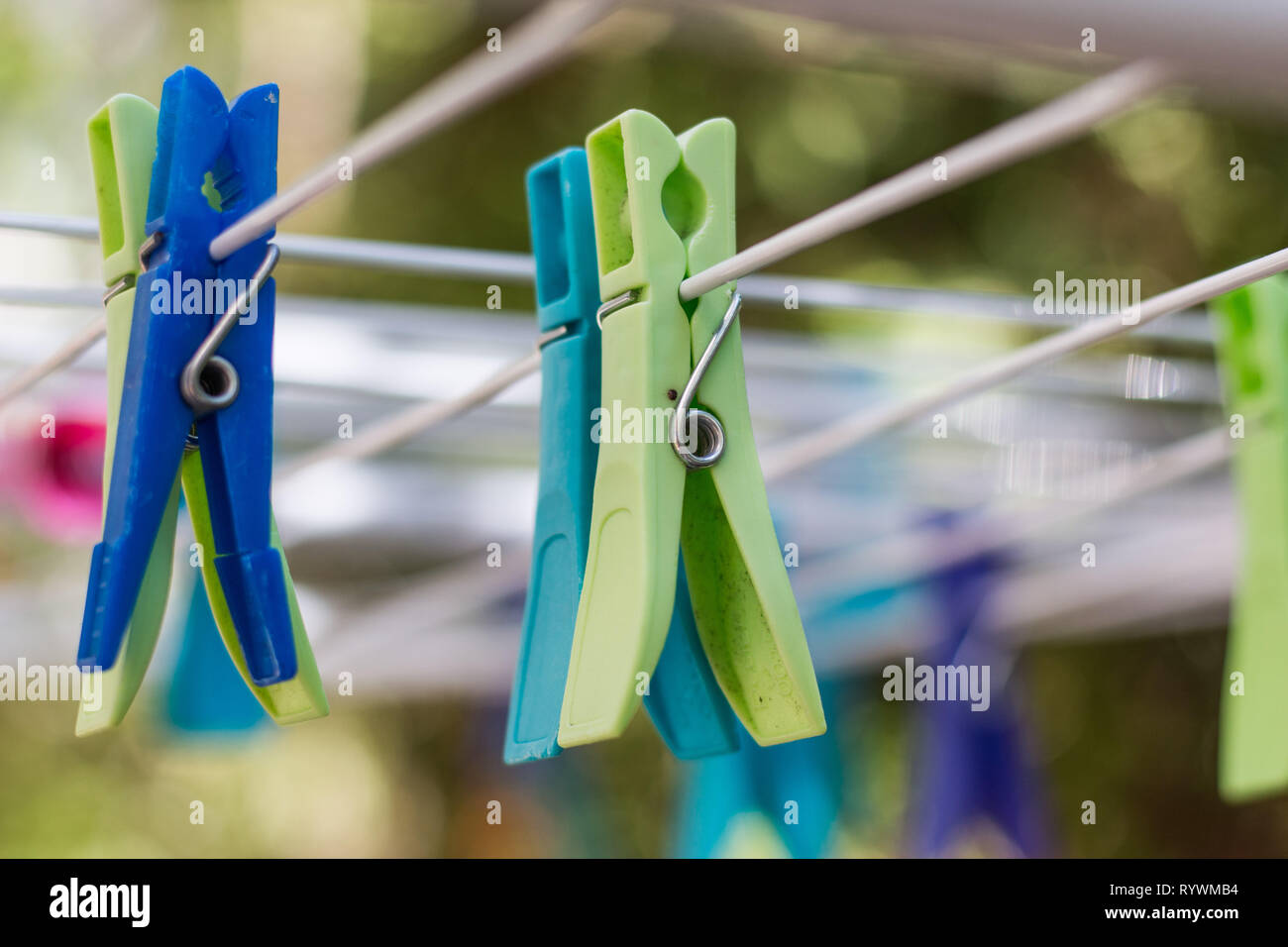 Clothespin clamp on rope, colourful, outdoors Stock Photo Alamy