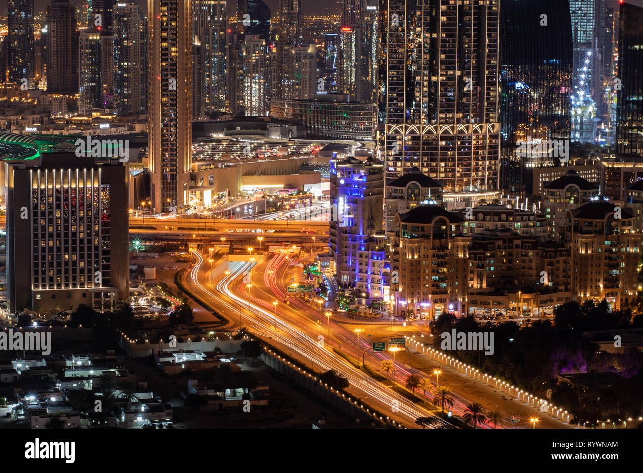 Colourful night time view of downtown Dubai Stock Photo Alamy