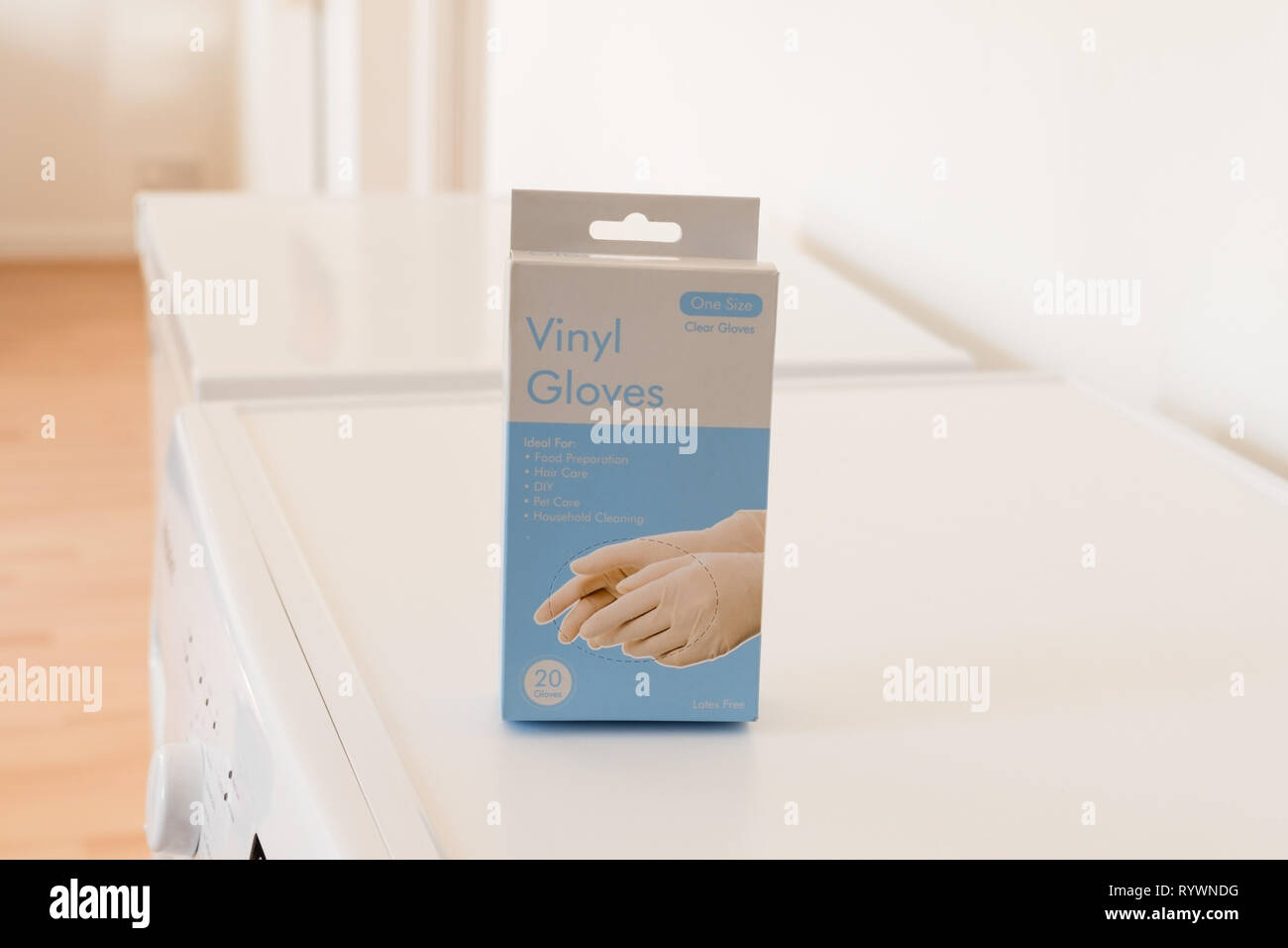 Largs, Scotland, UK - March 15, 2019: A box of latex free vinyl gloves in a  recyclable cardboard box and sitting on a white Kitchen or utility room  Stock Photo - Alamy