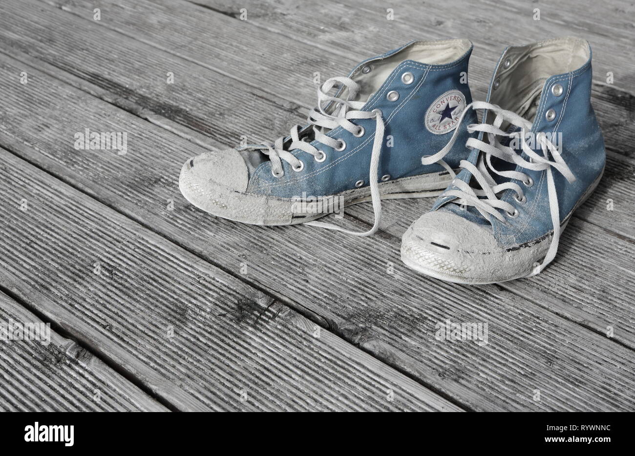 Groningen, Dutch - Oct 30, 2018: Converse shoes on wooden planks. Sneakers  on wooden background with copy space. sneakers on wooden background Stock  Photo - Alamy