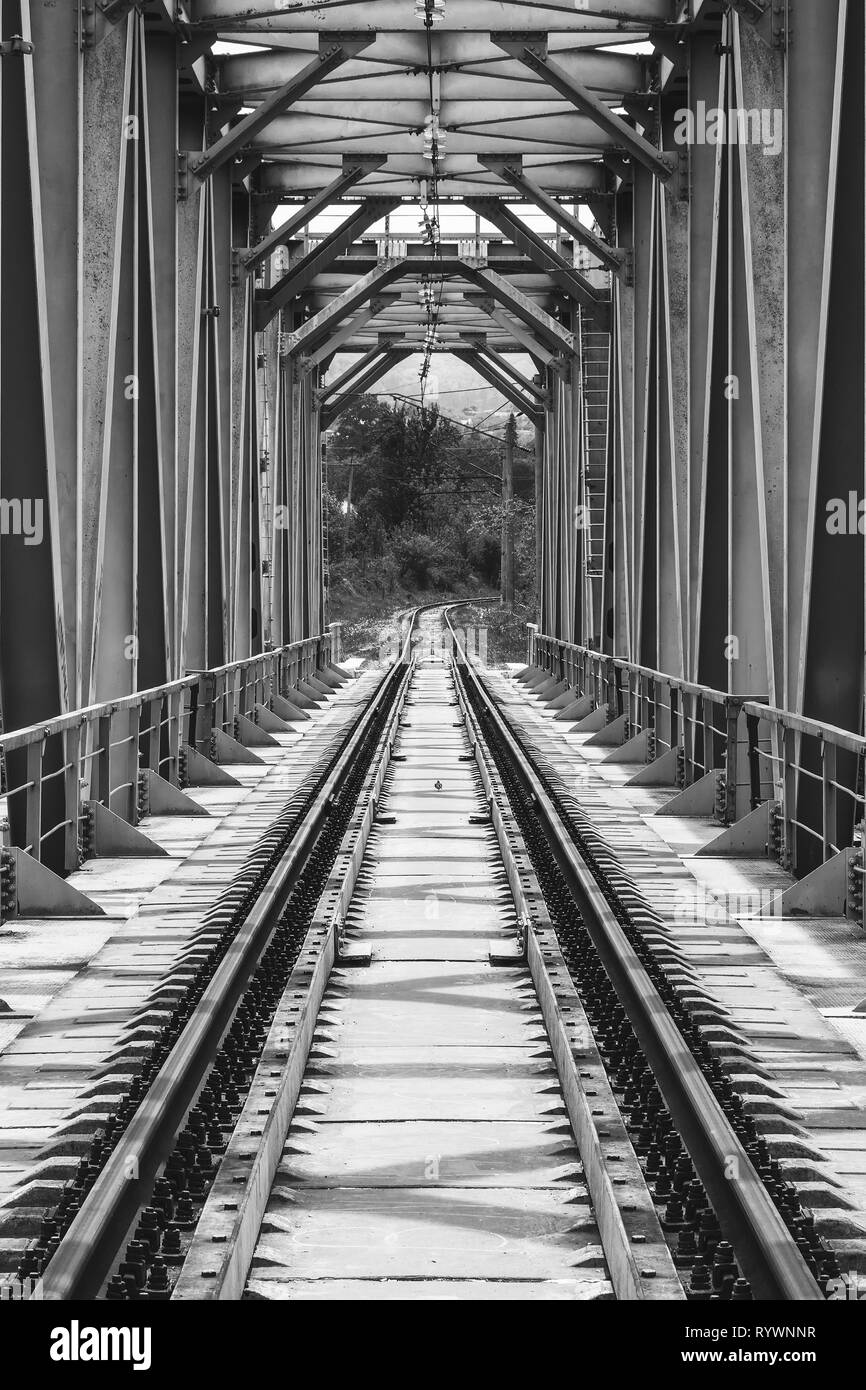 industrial landscape with railway bridge, black and white photo Stock Photo