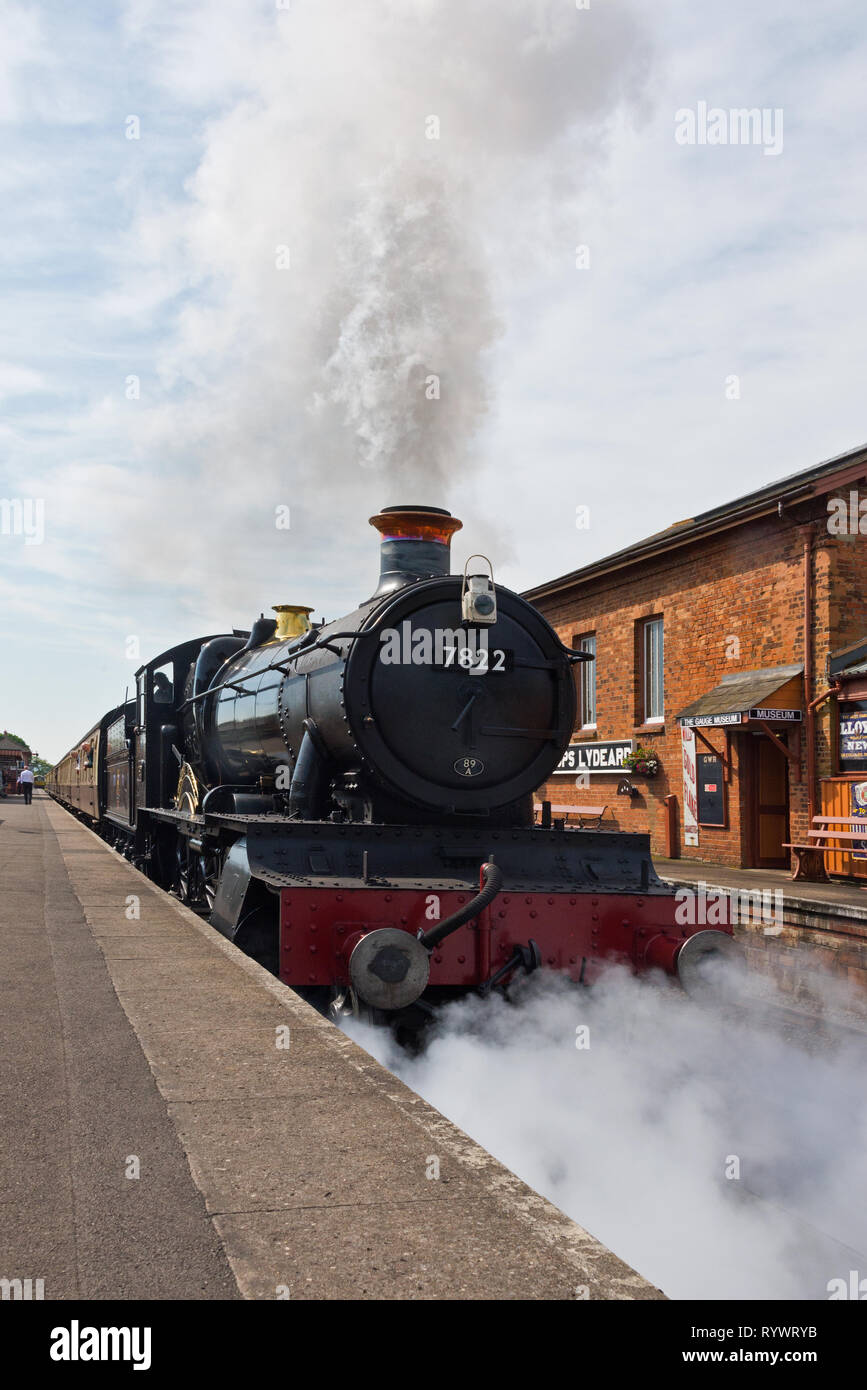 Manor Class steam locomotive 7822 Foxcote Manor preparing to leave Bishops Lydeard Station, on the West Somerset Railway in Somerset, England Stock Photo