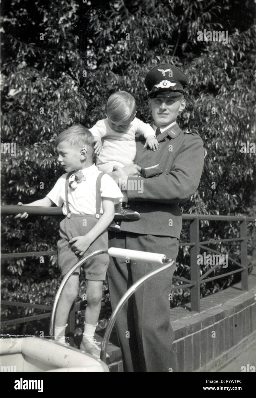 Leipzig, Germany - 1941: Luftwaffe officer and his sons Stock Photo
