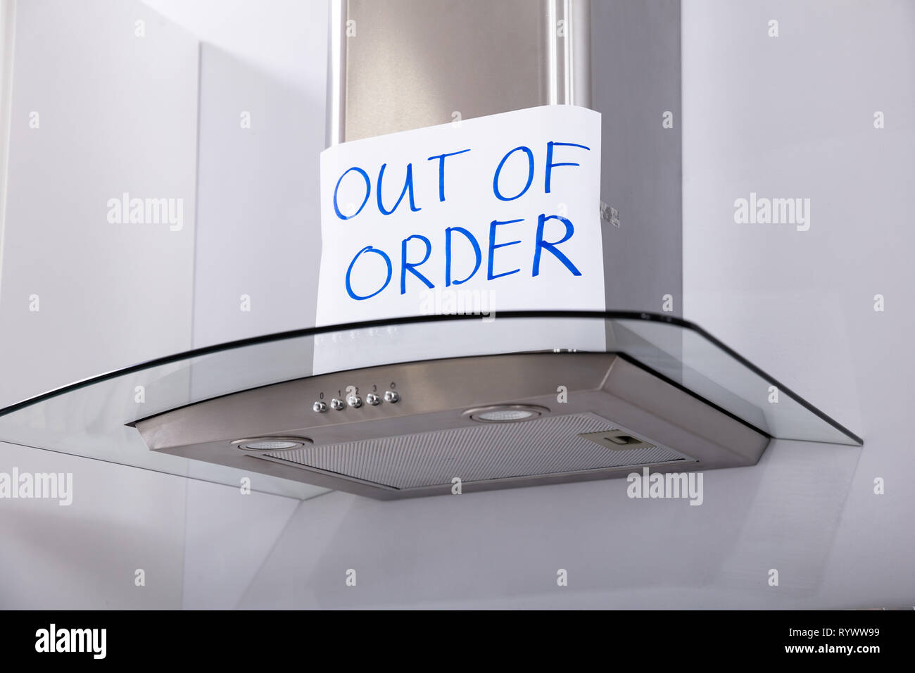 Written Text Out Of Order Message On Paper Over The Stuck Extractor Filter In Kitchen Stock Photo