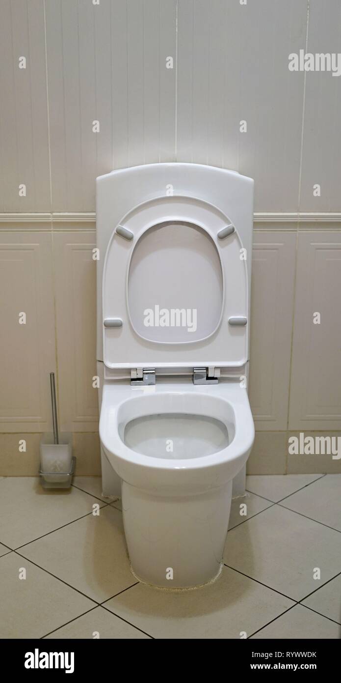 White bowl seat decoration in toilet room interior. WC in the toilet. Stock Photo