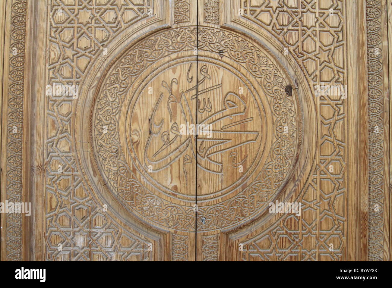 Beautiful ornately carved wooden doors on a Mosque in the village of Abusir, Cairo Governorate, Lower Egypt Stock Photo