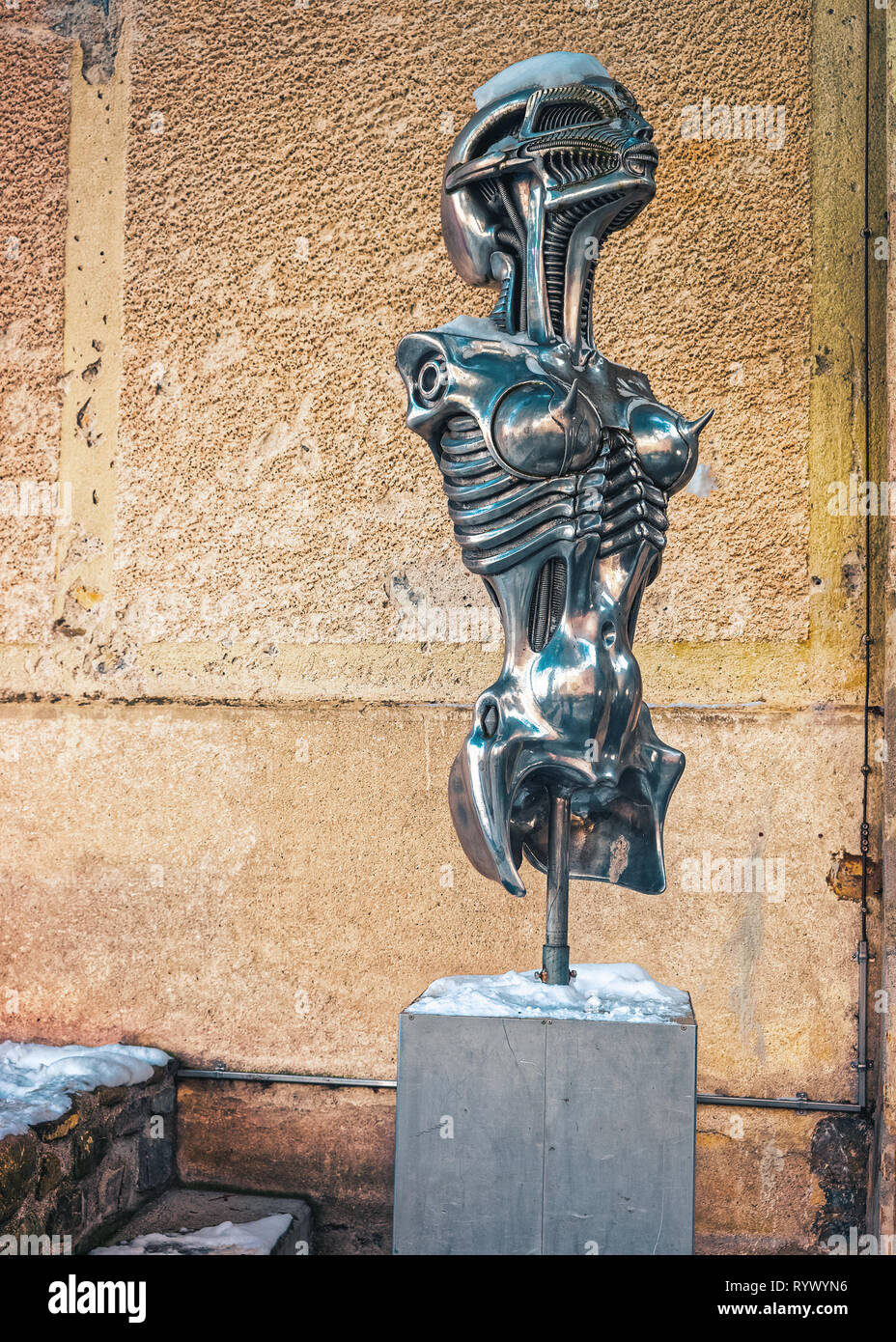 Gruyeres, Switzerland - December 31, 2014: Metal statue of Alien in HR Giger Museum in Gruyeres, Switzerland. Stock Photo