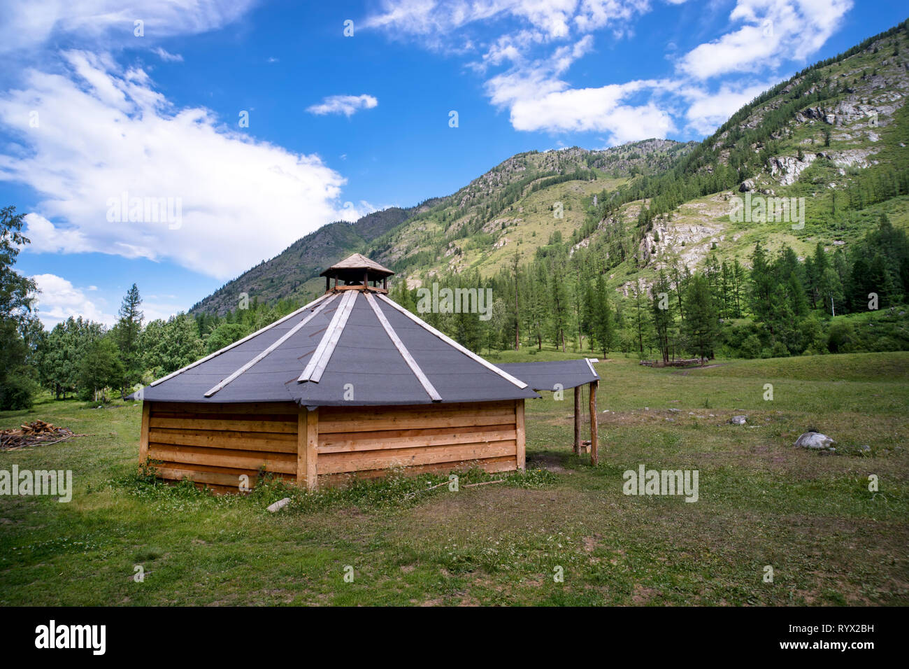ail. Traditional Mongolian portable round tent ger covered with white ...