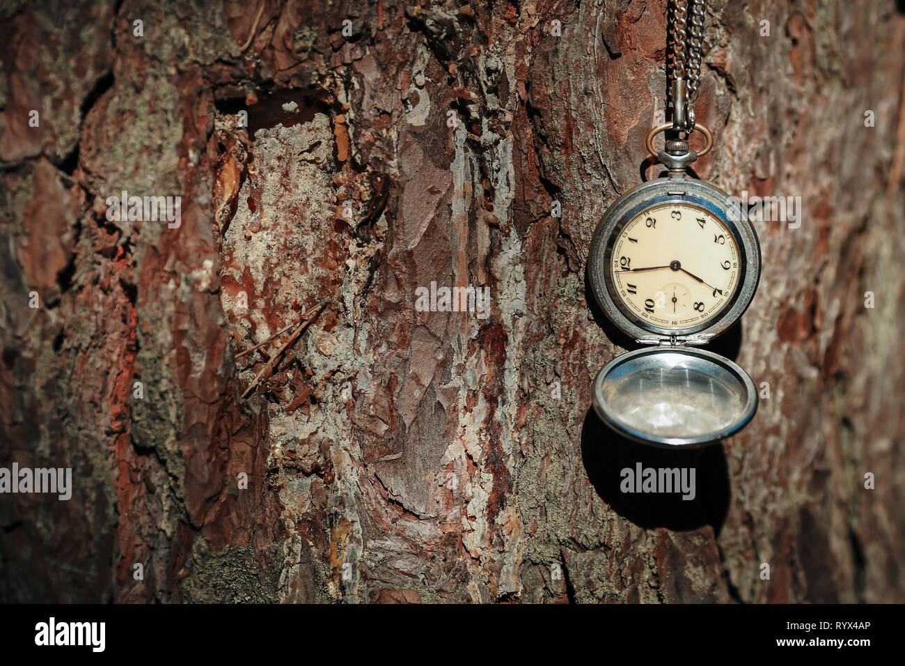 retro clock on a rope on a beautiful background Stock Photo Alamy