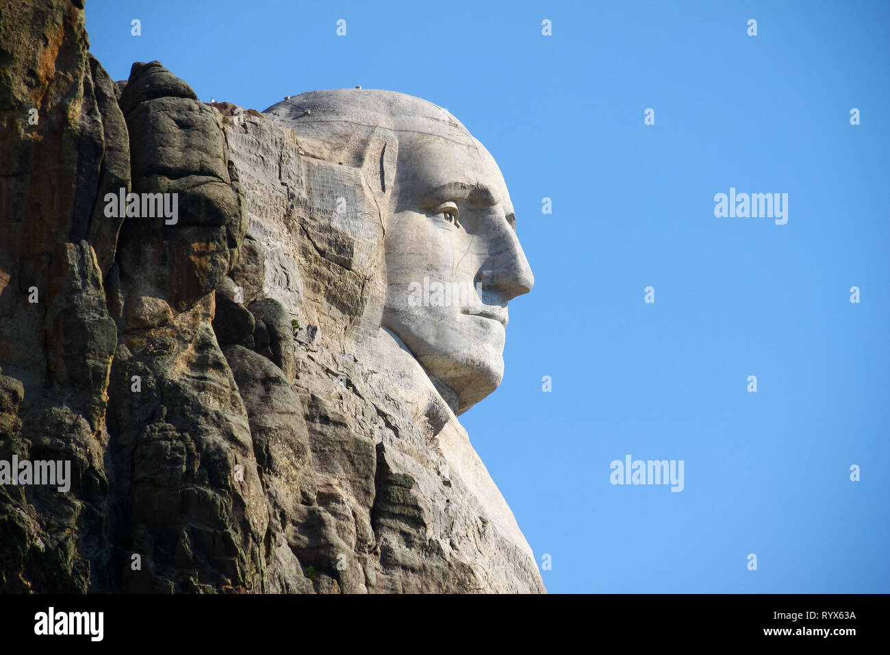 George Washington face at Mount Rushmore in South Dakota US from a side of the mountain Stock Photo