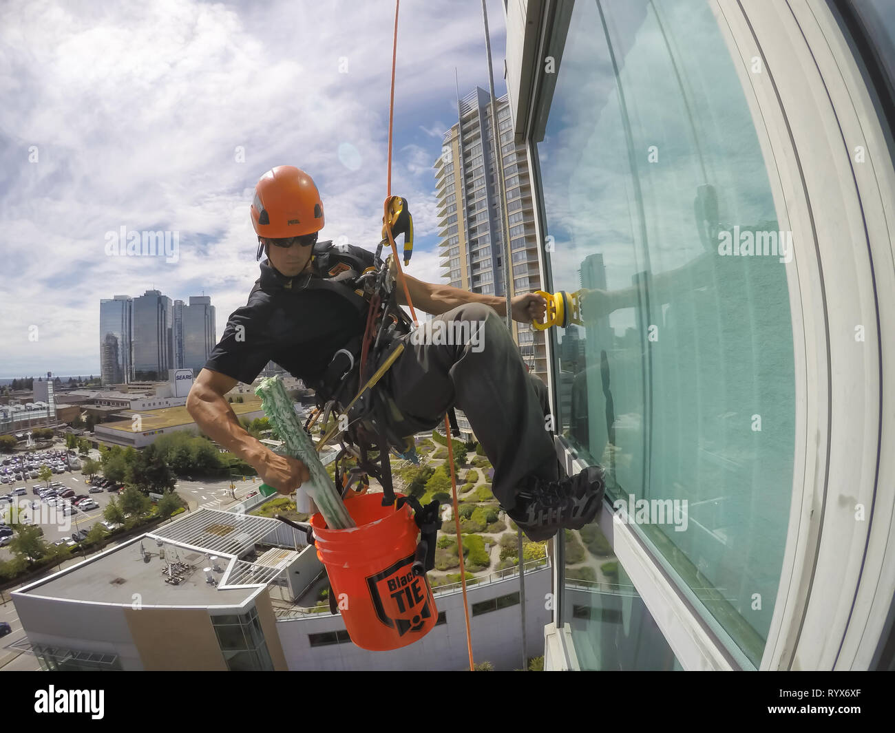 Rope access maintenance building Cut Out Stock Images & Pictures - Alamy