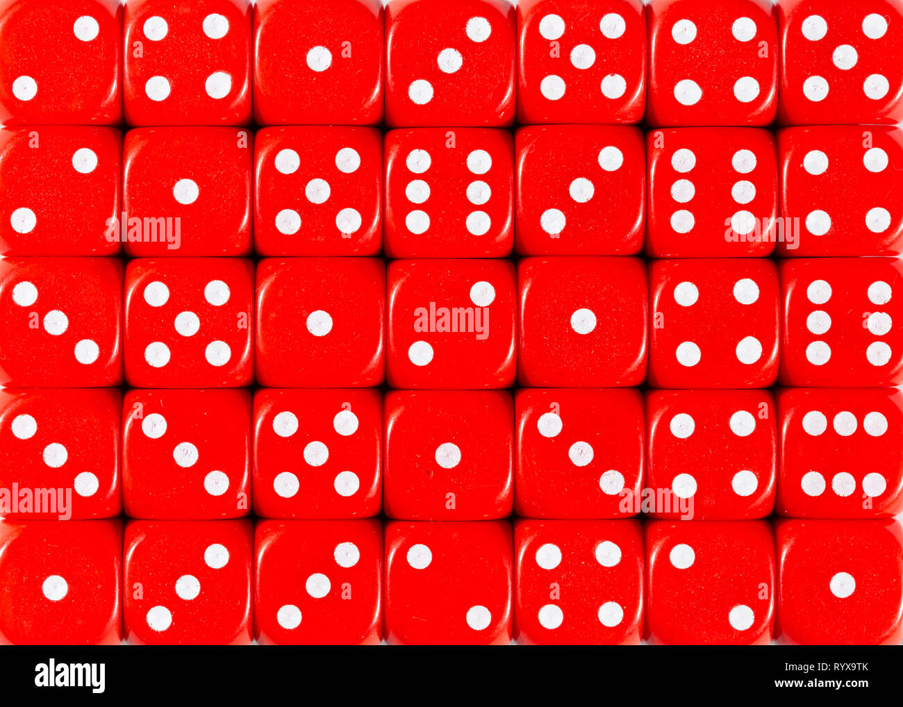 Background pattern of red dices, random ordered Stock Photo