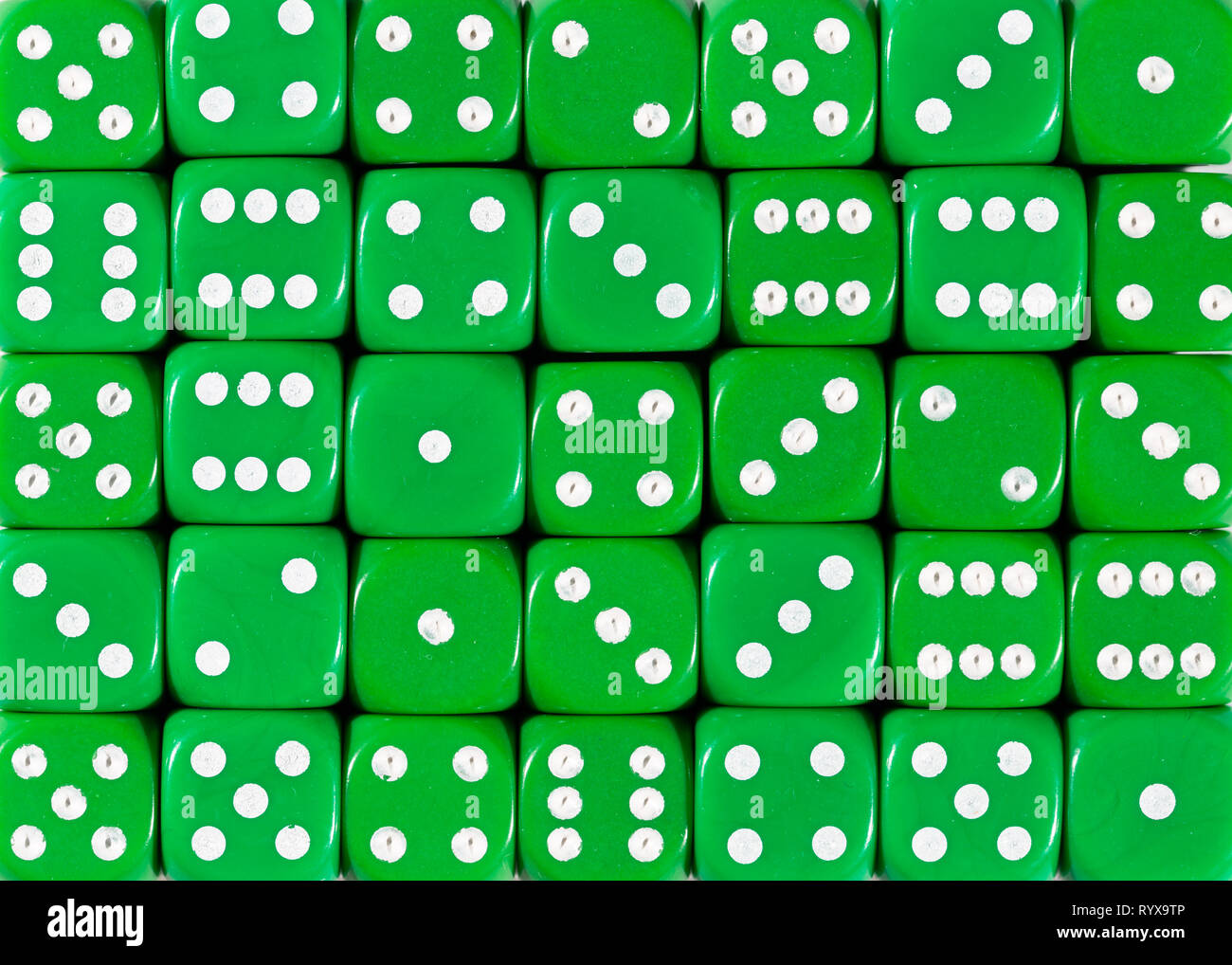 Background pattern of green dices, random ordered Stock Photo