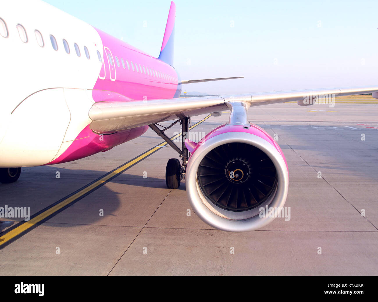 Commercial airplane parked at the airport Stock Photo - Alamy