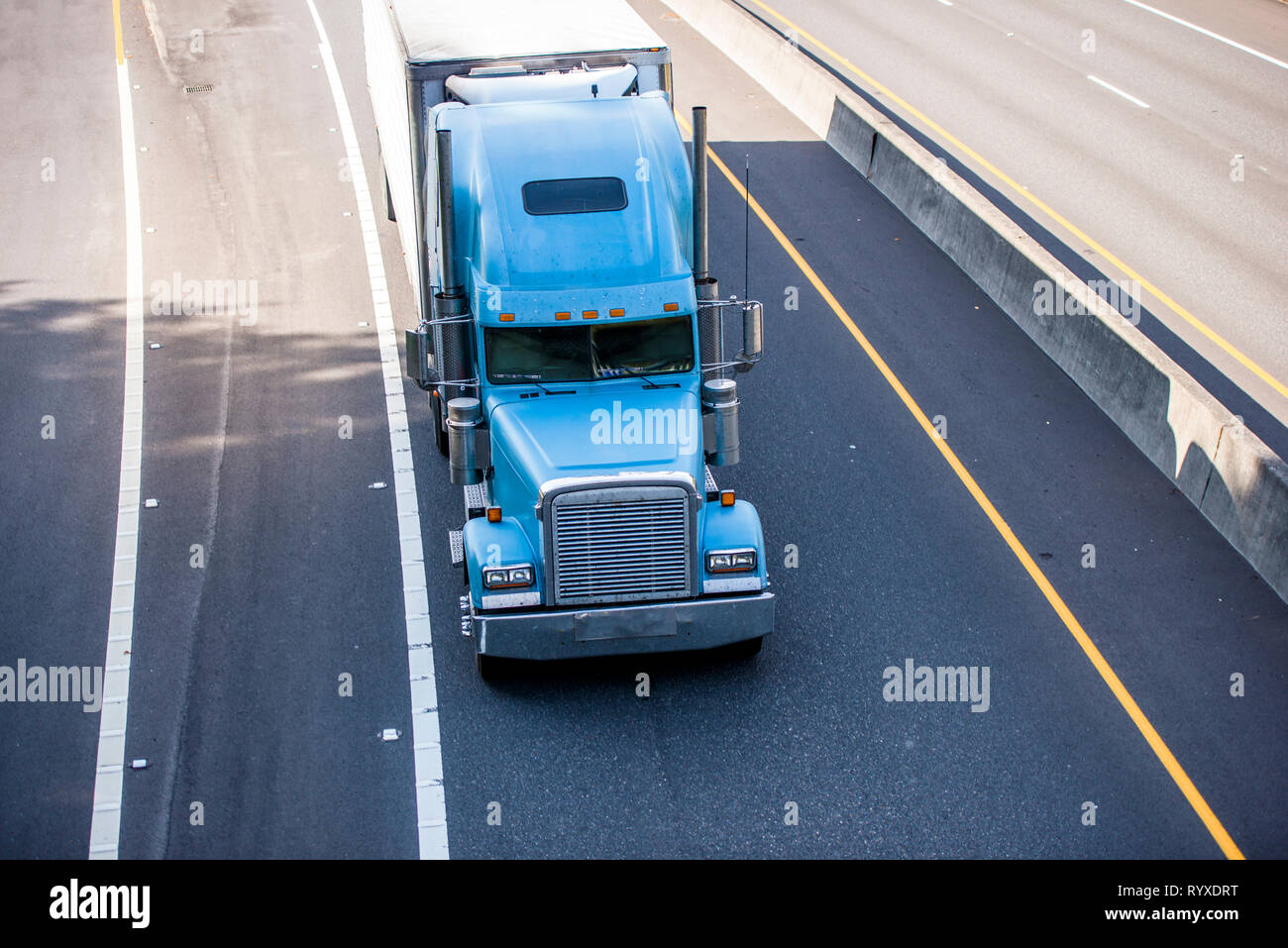 Classic old school design blue big rig bonnet long haul semi truck ...