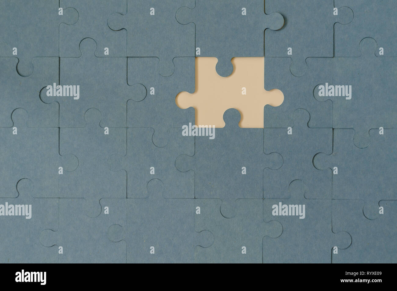 Background of blue puzzle with missing piece.Business strategy teamwork and problem solving concept. Stock Photo