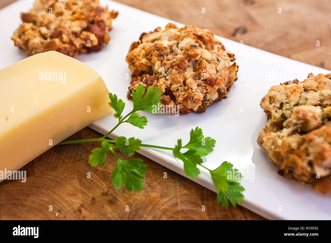Cheesy bread dumplings with herbs from Austria Stock Photo