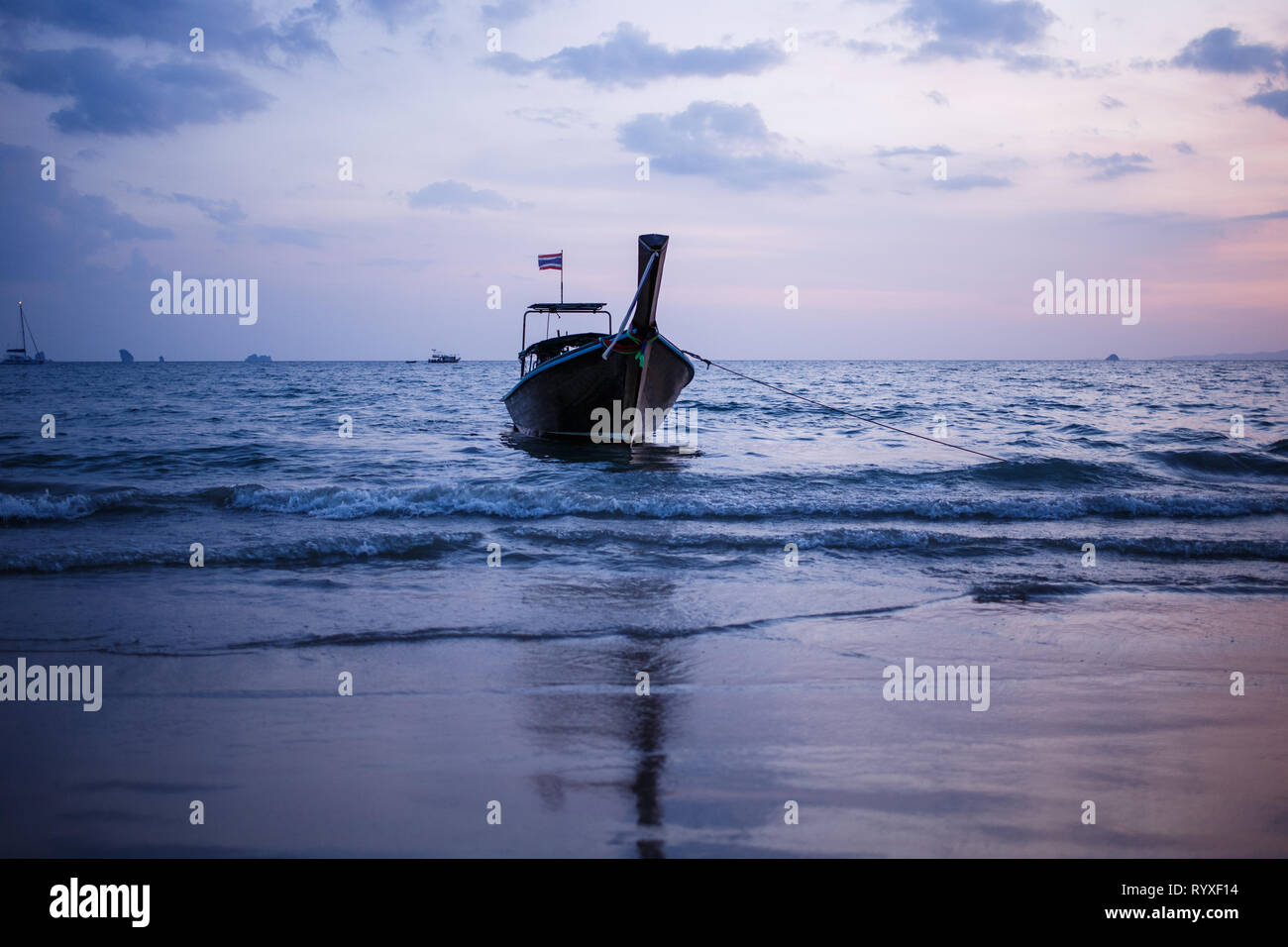 Longtail boat on sunrise. Stock Photo