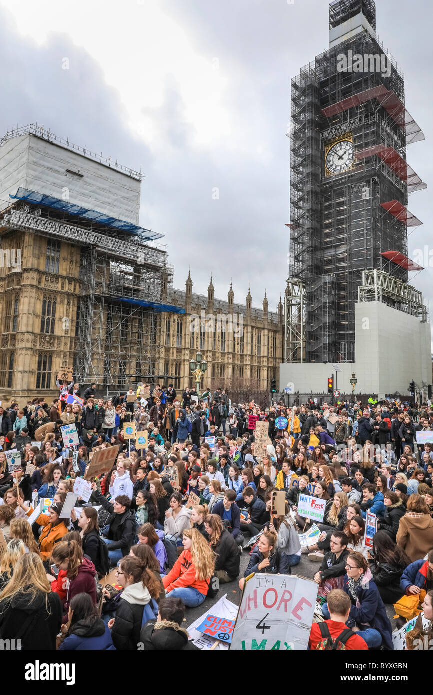 Westminster, London, UK, 15th Mar 2019. Young climate protesters make their voices heard on Westminster Bridge in the heart of London. Students, school children and young people in cities around the world rally in 'Youth Strike 4 Climate' action to protest against lack of government action against climate change. Credit: Imageplotter/Alamy Live News Stock Photo