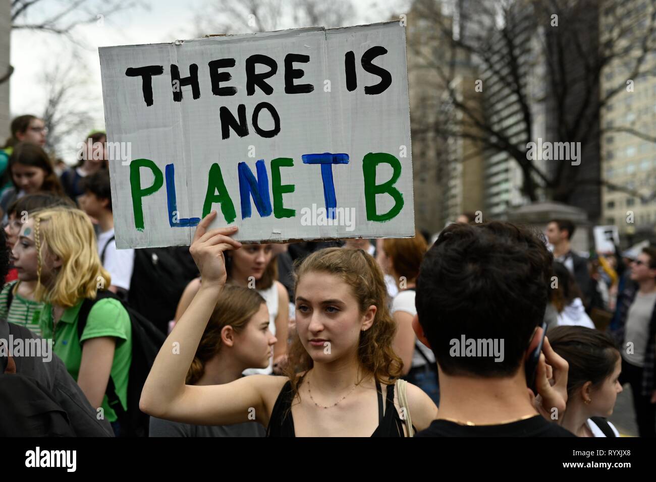 New York, US 15 March, 2019. gather in Columbus Circle for one of an expected 500 international Youth Strikes for Climate protests in 50 countries to demand world leaders take action against climate change. Credit: Joseph Reid/Alamy Live News Stock Photo