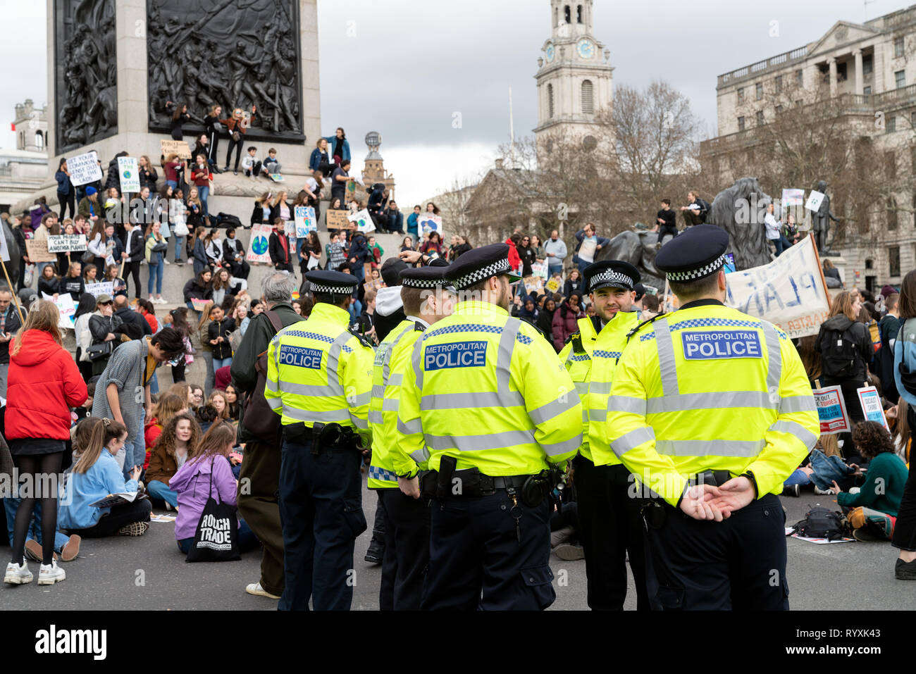 Police officers watch outside hi-res stock photography and images - Alamy