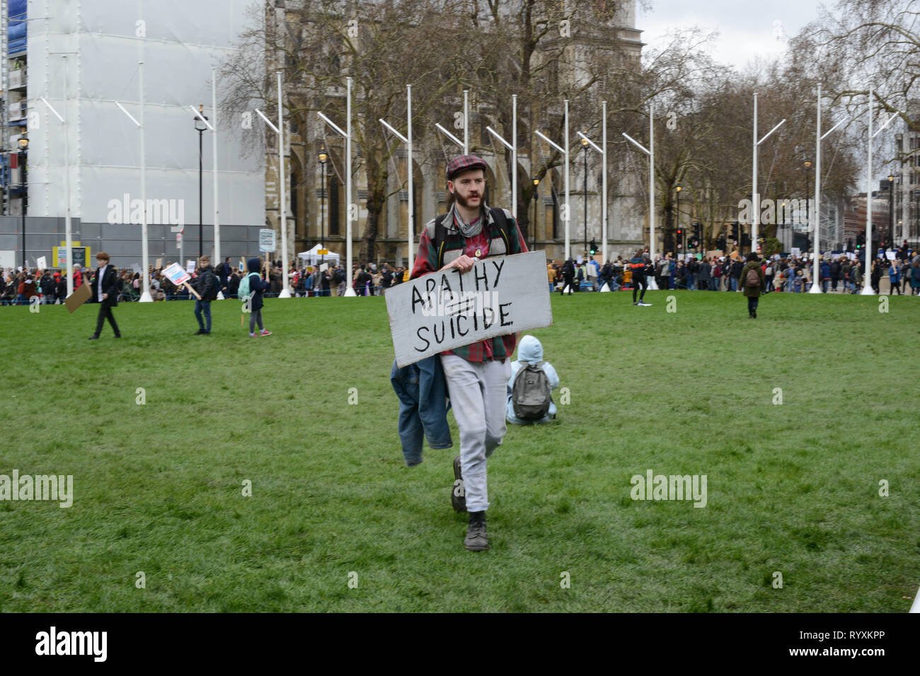 London, UK. 15th Mar, 2019. School climate strike March 15th 2019, London, Parliament Square: Swedish climate activist Greta Thunberg inspired UK students to protest climate change today by walking out of schools. Students are calling for the government to take action on global warming. Credit: Thomas Krych/Alamy Live News Stock Photo