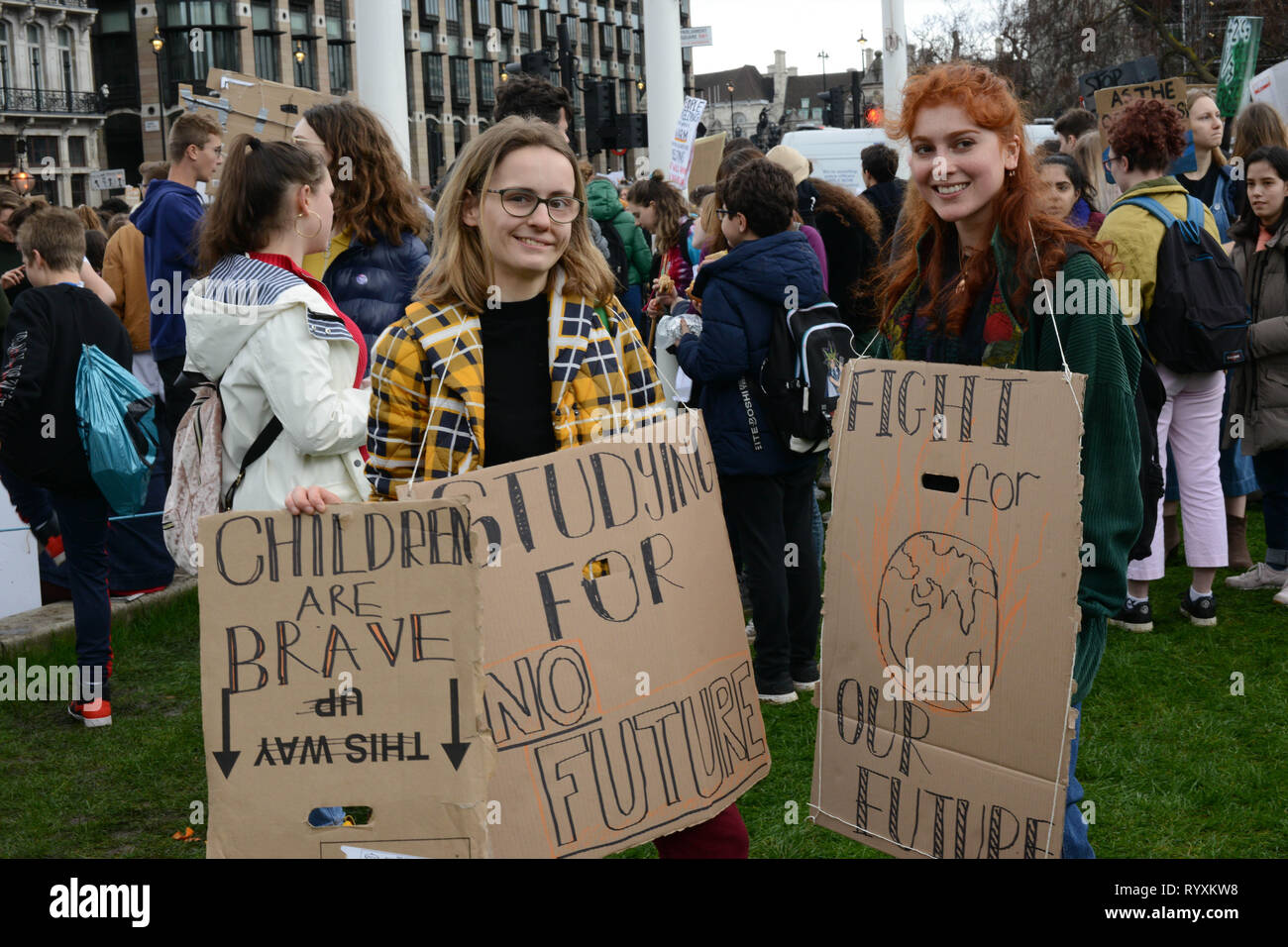 London, UK. 15th Mar, 2019. School climate strike March 15th 2019, London, Parliament Square: Swedish climate activist Greta Thunberg inspired UK students to protest climate change today by walking out of schools. Students are calling for the government to take action on global warming. Credit: Thomas Krych/Alamy Live News Stock Photo