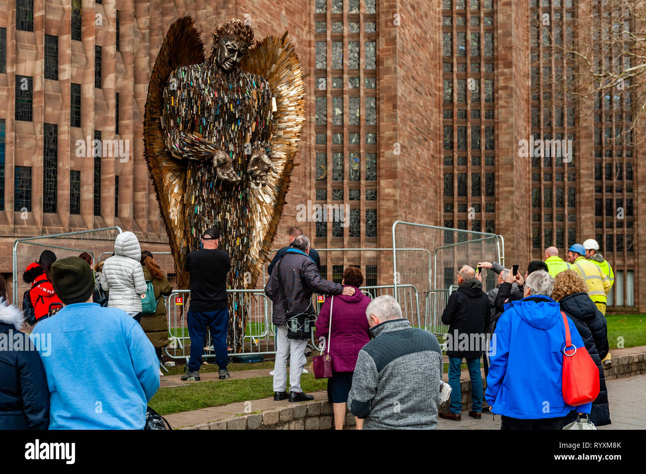 Coventry, West Midlands, UK. 15th March, 2019. The Knife Angel which was installed at Coventry Cathedral yesterday drew big crowds of spectators today.  The country is currently in a grip of knife violence. It is hoped the sculpture will highlight the issue and have a positive effect on the public. Credit: Andy Gibson/Alamy Live News. Stock Photo