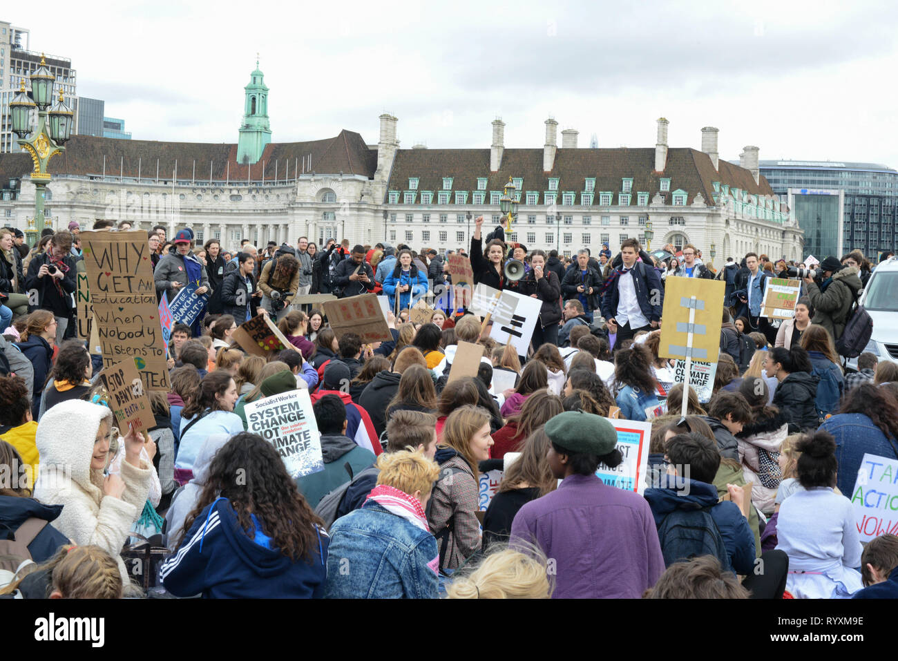 London, UK. 15th Mar, 2019. School climate strike March 15th 2019, London, Parliament Square: Swedish climate activist Greta Thunberg inspired UK students to protest climate change today by walking out of schools. Students are calling for the government to take action on global warming. Credit: Thomas Krych/Alamy Live News Stock Photo