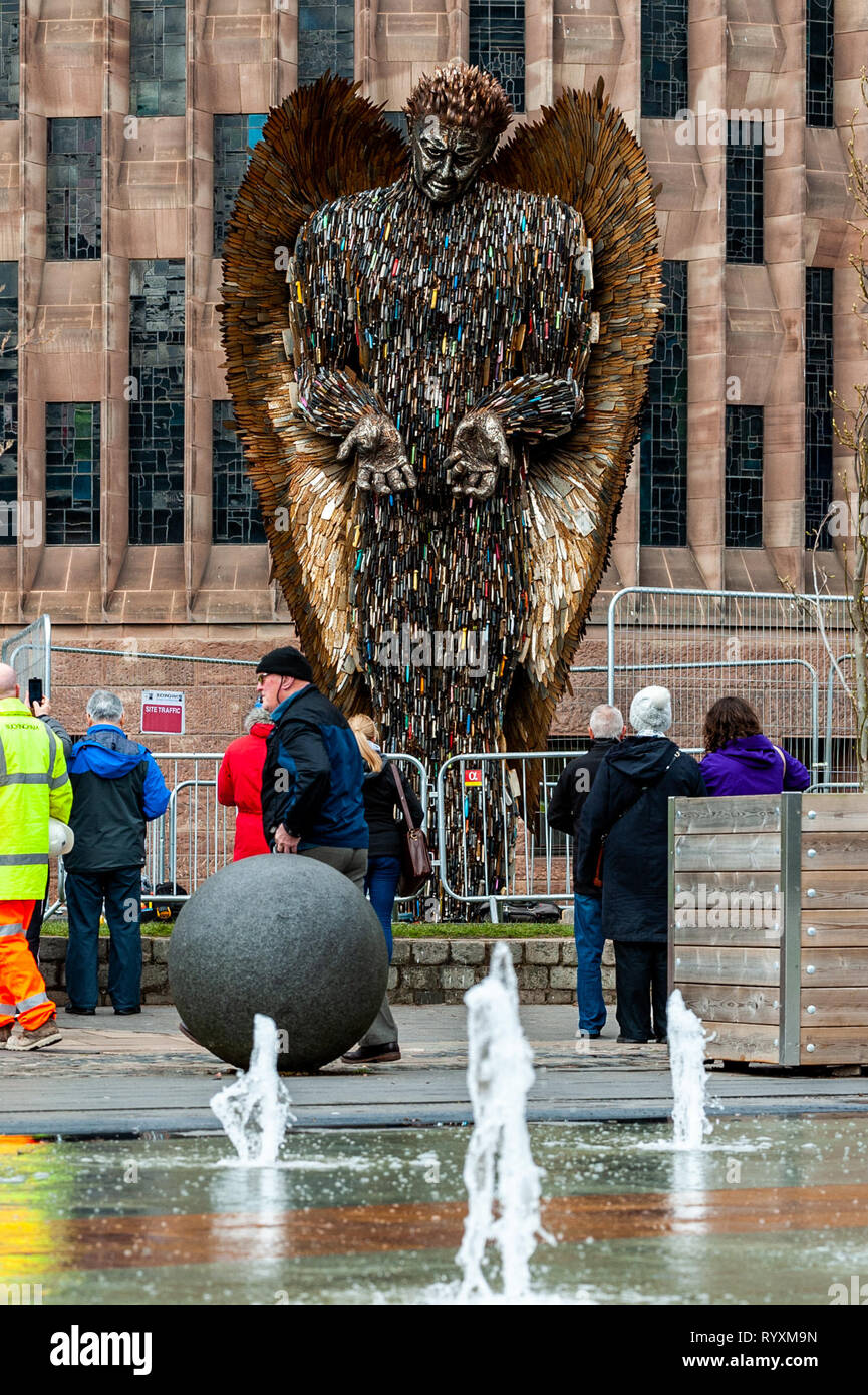 Coventry, West Midlands, UK. 15th March, 2019. The Knife Angel which was installed at Coventry Cathedral yesterday drew big crowds of spectators today.  The country is currently in a grip of knife violence. It is hoped the sculpture will highlight the issue and have a positive effect on the public. Credit: Andy Gibson/Alamy Live News. Stock Photo