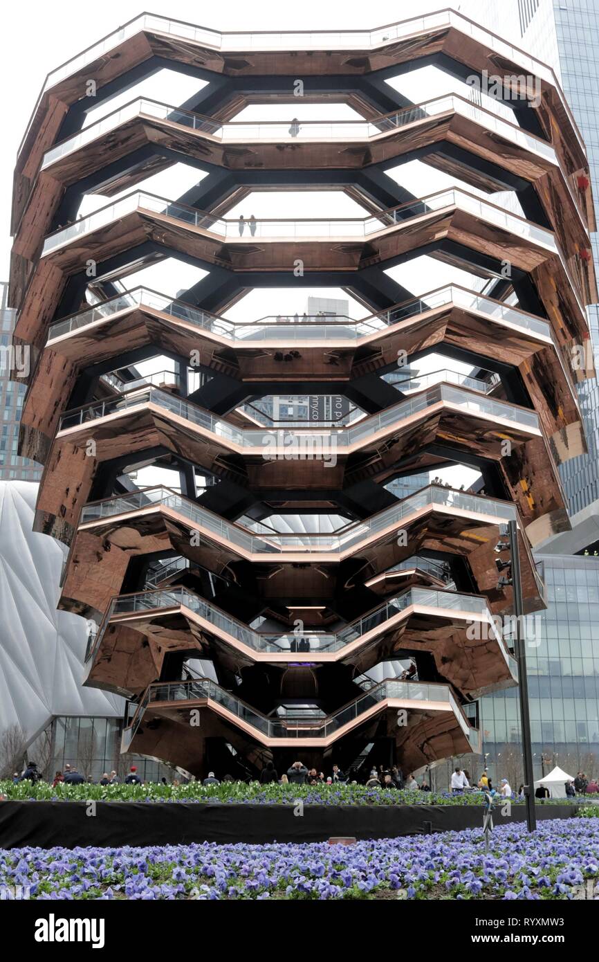 March 15, 2019 - New York City, New York, US - Hudson Yards, the largest private real estate development in American history opened to the public March 15, 2019 on the west-side of midtown Manhattan. The  $25 billion community rising above a working rail yard,  became an instant hit with its 4,000 residential apartments, 100 shops, office space, apartments, a public school and arts space â€“- featuring ''The Vessel'', a climbable sculpture made up of nearly 155 flights of stairs arranged into a honeycomb shape in the plaza. (Credit Image: © G. Ronald Lopez/ZUMA Wire) Stock Photo