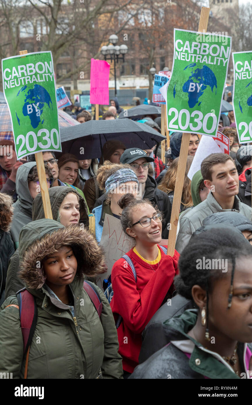 Ann Arbor, Michigan, USA. 15th Mar, 2019. Students rallied at the University of Michigan as part of an international strudent strike against climate change. They called for a reduction in greenhouse gas emissions and implementation of the Green New Deal proposed in Congress. Credit: Jim West/Alamy Live News Stock Photo
